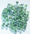 100 4mm Faceted Crystal, Green, & Purple Firepolish Beads